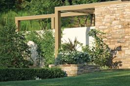 Arentz Landscape Architects designed the grounds at Running Cedar, which include entertaining-scaled spaces that give the house context.