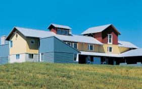 Assembled as something of a collage of rural building types, this weekend home brings a sophisticated urban sensibility to its pastoral setting.