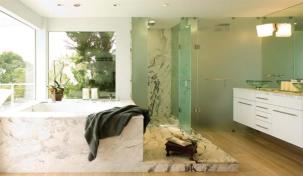 n the bath, window openings mimic tub dimensions, and the ceiling-mounted tub filler aligns with recessed light fixtures. Such symmetry has a soothing effect, says architect Mark English.