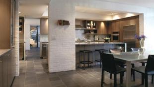 The kitchen's footprint didn't change, but it looks and feels bigger than the original, thanks to a raised ceiling and reconfigured plan.