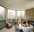 The kitchen connects to the outdoors with a screened porch complete with a gas fireplace. Perfect for dining, the space could be used six months a year in this climate. This would also be a great place for young children to play during meal prep.