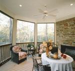 The kitchen connects to the outdoors with a screened porch complete with a gas fireplace. Perfect for dining, the space could be used six months a year in this climate. This would also be a great place for young children to play during meal prep.