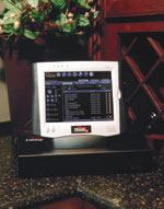 The wireless CorAccess Web Pad from Home Director is just one element of a complete home control system, which provides services such as whole-house Internet access, sound control, interactive television, and digital photo management.