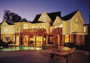 A Juliet-style balcony off the master suite and the gathering room's deck have views to the pool below.