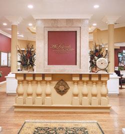 Spectrum Skanska's inviting 2,223-square-foot sales pavilion features a screening room where prospects can take virtual reality tours of the luxury homes.