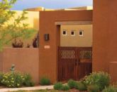 At Rancho Viejo, homes in the Courtyard series feature architectural elements that have become synonymous with Santa Fe style: flat rooflines, courtyards, stylized entries, and stucco-finished curves.