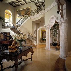 This entry shows off low-maintenance interior flooring, and wide hallways and stairs.