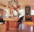 By lavishing attention on the design and craft of details like the wrought-iron potrack and the above-range mantelpiece, Good achieved the rustic, old-fashioned character he and the clients were after.