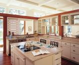 The wood slats forming partial walls in this South Carolina Low Country kitchen recall the agricultural pens of the surrounding countryside.
