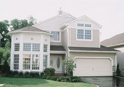 Ninety percent of buyers who chose single-family homes like this Ashford model opted for full basements, which added an average of $35,000 to the price tag. Other upgrades included extensive landscaping, paver driveways, kitchen cabinets and countertops.