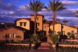 The 5,300-square-foot Ultimate Family Home takes its design cues from Spanish architecture and includes such traditional details as deep eaves, recessed windows, decorative ironwork, a boosted clay tile roof, and a smooth stucco and brick exterior.