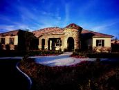 LIVING LARGE: Not all immigrants are struggling; in fact, many are flourishing. This 3,029-square-foot home from KB Home is popular with established immigrants searching for move-up housing in Las Vegas' Iron Mountain Ranch.