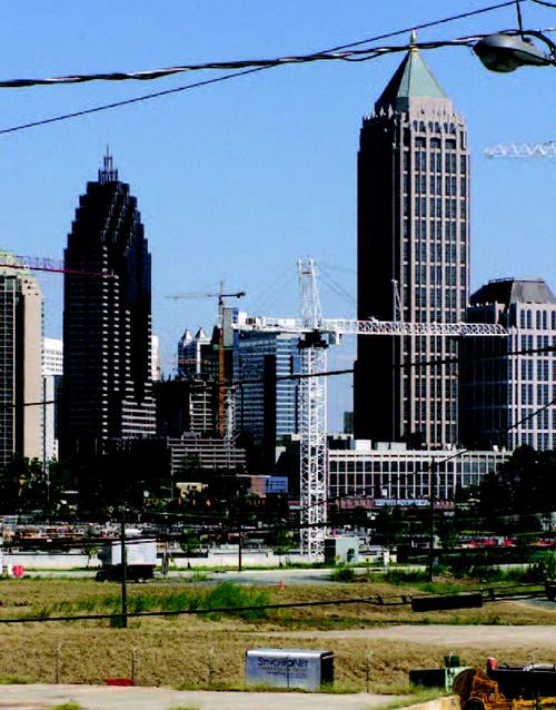 GRAND VISTA: Positioned just opposite midtown Atlanta, the Atlantic Station brownfield development (partially visible in foreground) has drawn national attention. Careful management of polluted areas makes the site suitable for both commercial and residential living.