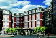 HIGH-END HIGH-RISE: Corinthian's five-star approach to condo living is attracting executive boomers.