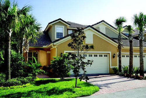 ACTION-PACKED PLAN: The 2,240-square-foot Allamanda plan, the most popular choice at The Sabals, features a two-car garage, a first-floor master suite, a screened lanai, and vaulted ceilings in the living and dining rooms.