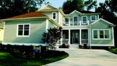 BEACH BEST-SELLER: The 2,853-square-foot Laurel plan has four bedrooms and three and a half baths and offers several options for expanding the living space. A screened-in back porch and second-floor balcony come standard.