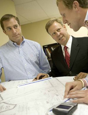 FAST TRACK: After weathering bumps in the Washington-area home building market and growing slowly for several years, Caruso Homes has set itself up for rapid growth. Owner and CEO Jeffrey Caruso and president and COO David Herzog pack much into their days to facilitate that growth, meeting with staff members to choose everything from what new products to use in their homes to which new parcels of land to buy. One of the biggest choices lies ahead: A satellite office in Virginia has spurred the company's growth farther south, and it's considering expanding to additional states.