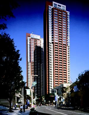 HIGH STYLE: Roppongi Hills, a mixed-use development by Mori Building Corp., is helping to redefine downtown Tokyo as a place to live as well as to work. Overhead pedestrian walkways and underground passages to subway stops help preserve green space at ground level.