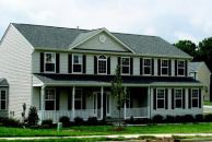 TOP CHOICE: Four elevations are available for the 2,835-square-foot Hawthorn Lux plan. The Virginia colonial model (pictured) features an optional sunroom on the back, a street-friendly front porch, and plenty of windows.