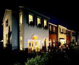 EAST MEETS WEST: Georgetown, a new development in San Jose, Calif., takes its design cues from the row houses built in Baltimore and Washington from 1790 to 1820, although its elevations incorporate a dash of West Coast style. Simple roof lines and door trim details reflect the Italianate and bungalow styles seen in the surrounding neighborhoods.