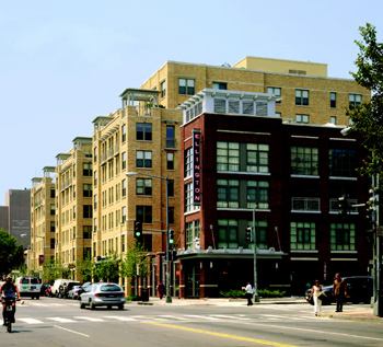 DOWNSIZING: Whereas District of Columbia zoning requirements for the U Street frontage allowed construction up to 90 feet, the 13th Street elevation (which faces a residential block) was another story, thus the scaled-down massing on the red brick portion of the building.