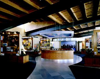 FRONT AND CENTER: With several stories to tell inside (above) and outside (below, left), and in a variety of presentation formats including video projections, computer, 3-D, and full-scale vignettes, The Discovery Center in Seattle sets a new standard for sales center design and success.