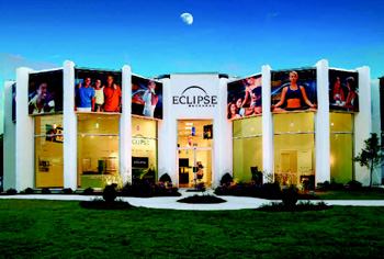 MOON SHOT: Developer Novare Group leased a former auto dealer-ship a stone's throw from the Eclipse project and applied the cost savings to convert the interior into a stellar sales center.