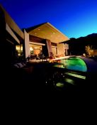 PATIO DADDY-O: Hard angles and sleek curves combine to create dynamic, open living spaces in the 2006 home of the year, a nod to mid-mod in Palm Springs, Calif.