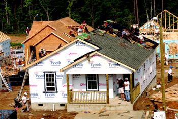 EAGER TO WORK: After more than 18 months of planning, builders and trade contractors couldn't  wait to get started on their blitz-build houses. For about a third of the  builders, this was their first involvement with Habitat.