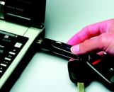 SNAPS IN: The new Snap-Link USB key lets users access an HAI network remotely from any  computer.