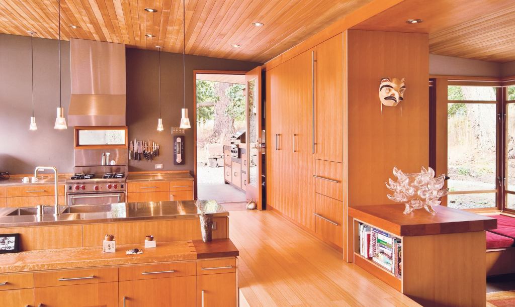 Light natural woods like bamboo floors, fir cabinetry, and hemlock ceilings create a warm yet bright interior palette.