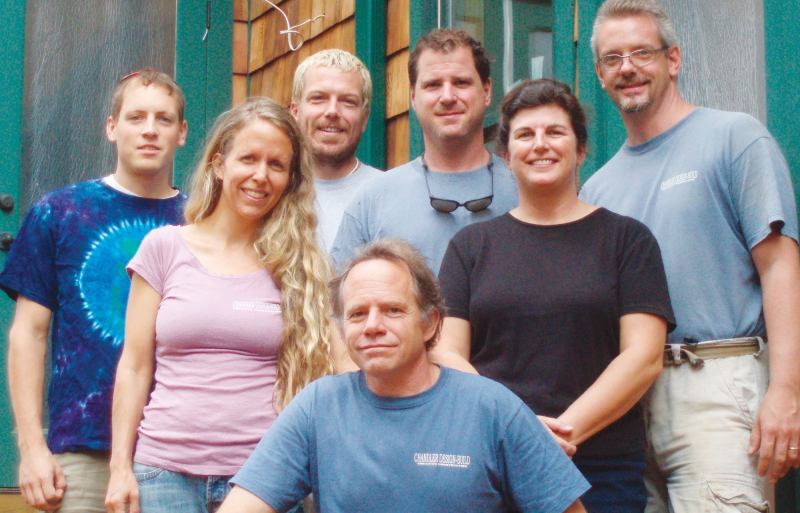 Michael Chandler (front center) offers a flexible profit-sharing plan to promote staff loyalty and profit consciousness.