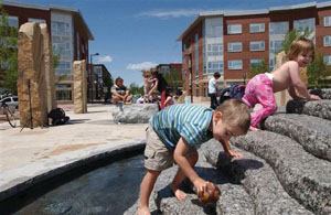 WATER AMENITY:"Colorado Water Scenerio," a public fountain and sculptural homage to water conservation, debuted in 2003 in the west crescent of the East 29th Avenue Town Center in Stapleton. Once completed, the 4,700-acre urban renewal zone will house 30,000 residents as well as a number of public art works.