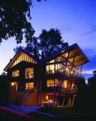 Architects Beth Reader and Chuck Swartz remodeled their Virginia tract home (see “before” shot below) to make the most of its mountain views. The addition added an extra 700 square feet on two floors and required no variances.