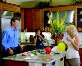 MEET THE FAMILY: Professional actors portraying a real family living in one of Centex Homes' models  are hired to engage prospects with information about the home's features  and amenities ... and perhaps a slice of birthday cake.