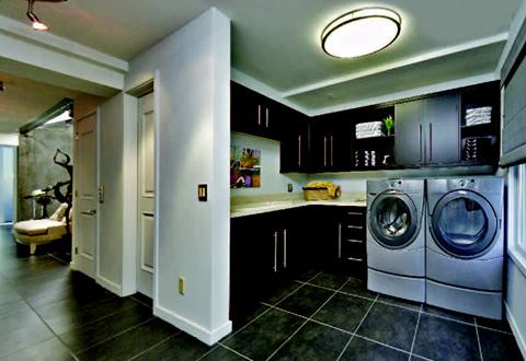In the back of the plan is a mudroom (above) that enables the occupants to unload groceries brought in from the detached garage, which is separated from the house by a trellised pool area and garden (below), before taking the elevator to the third-level kitchen.