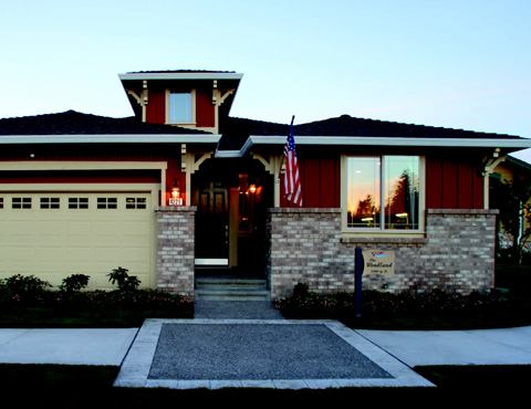 WIDE OPEN: The Woodland plan (above), the Meridian model (below), and the Americana (bottom) bear  the hallmarks of all 14 home styles available at Jubilee at Hawks  Prairie: rooms that open onto each other for easy flow; optional decks off  the back; and warm, earth-friendly colors.