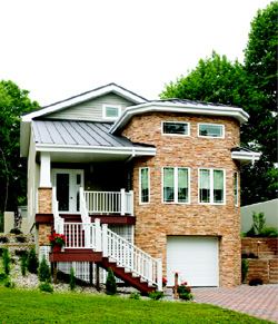 ENERGY MISER: This demonstration house costs $900 per year to heat and cool. It is 80 percent more efficient than the average home.