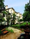 ROOM TO STROLL: A carefully planned site allowed William Lyon Homes to achieve a density of 16 units  per acre at Serafina, yet still provide its buyers with a sense of  openness. Private decks and courtyards overlook pocket parks with benches  and fountains and lush, landscaped paseos.