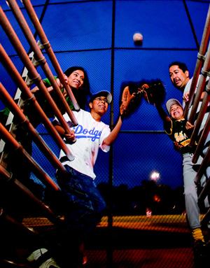 HOME FIELD ADVANTAGE: Jose and Erika Reyes were on the verge of becoming super-commuters, spending  hours a day on Southern California's crowded freeways. Among Erika's biggest  heartaches was telling her 12-year-old son that no one would be able to  take him to baseball practice. Then they heard about The Boulevard, a community  of market-rate, single-family homes and affordable townhomes.