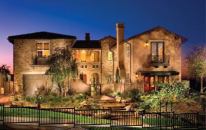 CURB APPEAL: Plan 1 at Scripps Preserve at The Estates at StoneBridge has a lot to like. Old  World Tuscan style, a stone-and-stucco façade, and plenty of details  give this home extra punch.