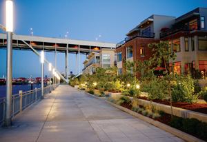 CITY MIX: The inhabitants of Riverscape townhomes are a diverse lot, including single  professionals, young married couples, families with small children, and empty-nesters.