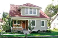 SEE AND BELIEVE: New England buyers are generally averse to detached garages, but that hasn't  stopped Leslie Clement from building them. “They look nicer, and the  end result is a friendlier looking street,” she says.