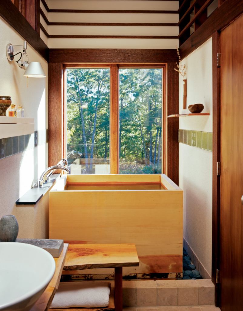 High ceilings and white walls contrast with the warm woods and give a feeling of airiness to the small space.