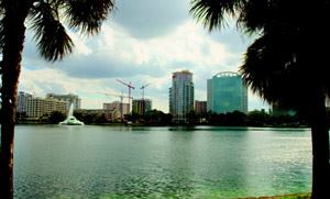 SPANNING TIME: The house physically and figuratively bridges two eras of Orlando's downtown housing history. To the north lies a historic grid of century-old, single-story homes; brick roads; and roundabouts that regulate traffic speeds (photos #3 and #4). A block to the south, views from the shore of Lake Eola (shown here) portray the city's ongoing condo boom and urban revitalization.