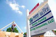 TEAM WORK. The walls are up and trusses are being set on a house in Birmingham, Ala., during the 2008 Habitat Home Builders Blitz. More than 1,000 building industry professionals have donated their time and resources this week to build 263 homes at sites throughout the country for low-income families in need of safe, decent housing.