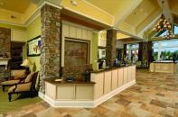 Double duty: A 6,000-square-foot Discovery Center  serves as a meet-and-greet sales office by day and a gathering spot for residents after hours.