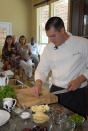Chef Harold Dieterle gives a cooking demonstration for Houston-area Realtors in a Beazer Homes model home.