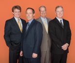 Left to right: Frank Connors, CFO; Bob Youngentob, president; Terry Eakin, chairman; and Andy Warren, COO.
