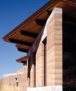The 18-inch-thick rammed-earth wall offers thermal benefi ts, as well as acoustic protection from a major highway at the bottom of the hill.